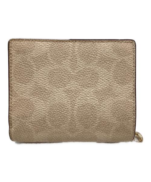 COACH（コーチ）COACH (コーチ) 2つ折り財布 ベージュの古着・服飾アイテム