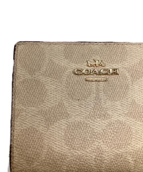 COACH（コーチ）COACH (コーチ) 2つ折り財布 ベージュの古着・服飾アイテム