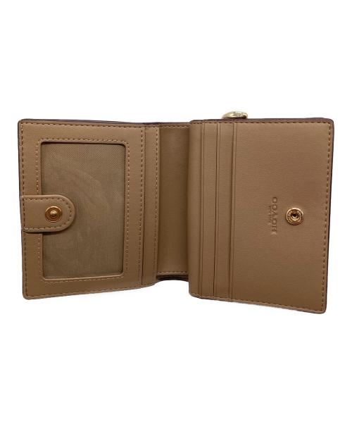 COACH（コーチ）COACH (コーチ) 2つ折り財布 ベージュの古着・服飾アイテム