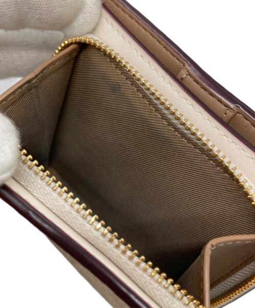 COACH（コーチ）COACH (コーチ) 2つ折り財布 ベージュの古着・服飾アイテム