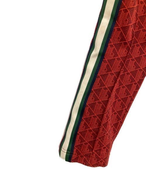 LACOSTE（ラコステ）LACOSTE (ラコステ) サイドテーピングモノグラムトラックパンツ レッド サイズ:XSの古着・服飾アイテム