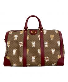 GUCCI×DORAEMON（グッチ×ドラエモン）の古着「ダッフルバッグ」｜レッド×ブラウン