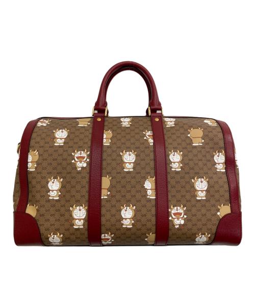 GUCCI（グッチ）GUCCI (グッチ) DORAEMON (ドラエモン) ダッフルバッグ レッド×ブラウンの古着・服飾アイテム