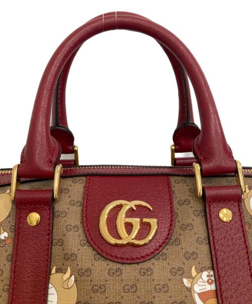 GUCCI（グッチ）GUCCI (グッチ) DORAEMON (ドラエモン) ダッフルバッグ レッド×ブラウンの古着・服飾アイテム