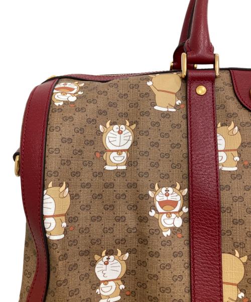 GUCCI（グッチ）GUCCI (グッチ) DORAEMON (ドラエモン) ダッフルバッグ レッド×ブラウンの古着・服飾アイテム