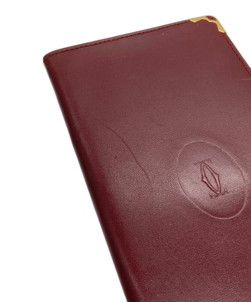 Cartier（カルティエ）Cartier (カルティエ) マストライン札入れ ボルドーの古着・服飾アイテム