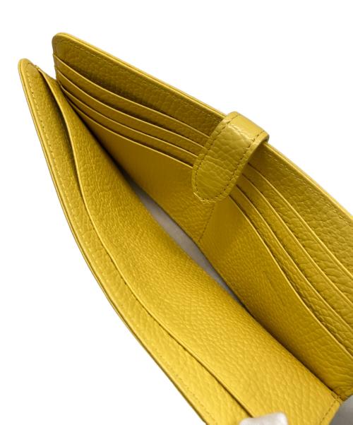 ATELIER NUU（アトリエヌウ）ATELIER NUU (アトリエヌウ) レザーウォレット イエローの古着・服飾アイテム