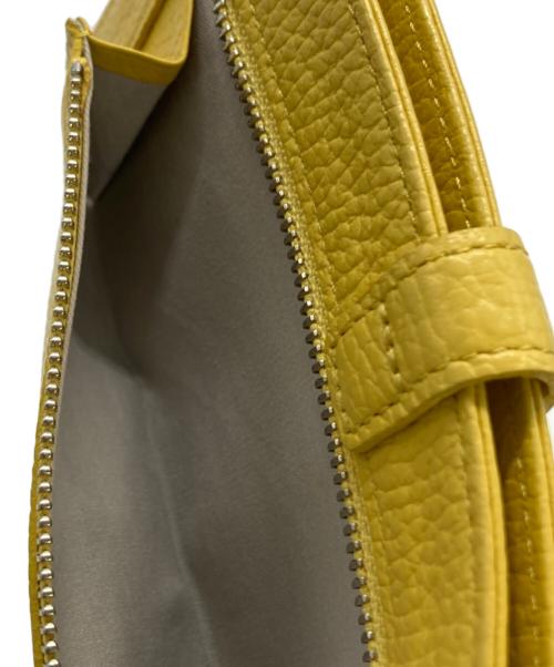 ATELIER NUU（アトリエヌウ）ATELIER NUU (アトリエヌウ) レザーウォレット イエローの古着・服飾アイテム