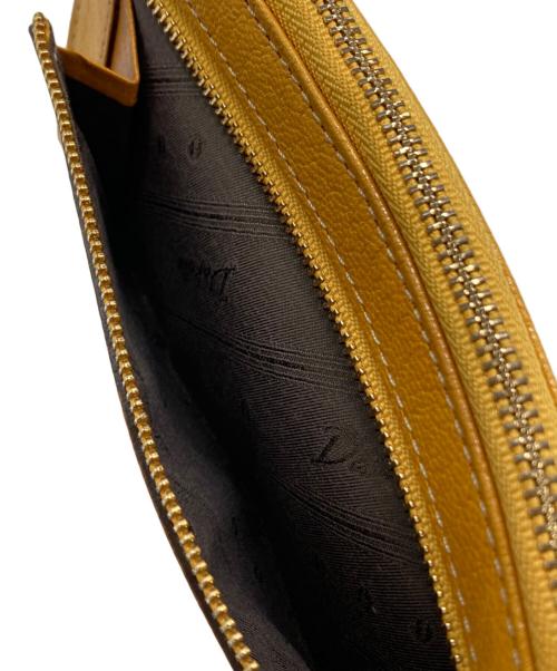 DAKOTA（ダコタ）DAKOTA (ダコタ) L字ジップ長財布 イエローの古着・服飾アイテム