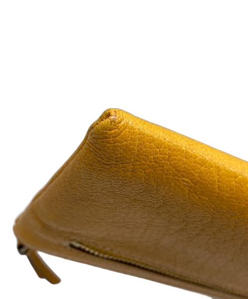 DAKOTA（ダコタ）DAKOTA (ダコタ) L字ジップ長財布 イエローの古着・服飾アイテム