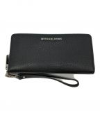 MICHAEL KORSマイケル・コース）の古着「ロングウォレット」｜ブラック