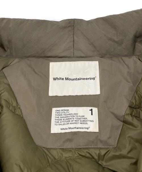 WHITE MOUNTAINEERING（ホワイトマウンテ二アニング）WHITE MOUNTAINEERING (ホワイトマウンテ二アニング) TAION (タイオン) コラボダウンジャケット オリーブ サイズ:1の古着・服飾アイテム