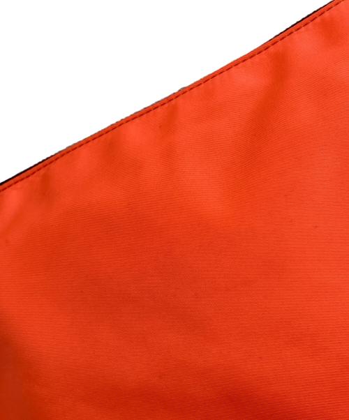 JIL SANDER（ジルサンダー）JIL SANDER (ジルサンダー) クラッチバッグ ブラック×オレンジの古着・服飾アイテム