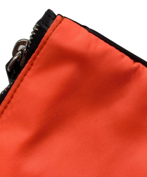 JIL SANDER（ジルサンダー）JIL SANDER (ジルサンダー) クラッチバッグ ブラック×オレンジの古着・服飾アイテム