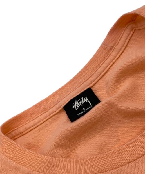 stussy（ステューシー）stussy (ステューシー) シャドーマンプリントTシャツ ピンク サイズ:Sの古着・服飾アイテム