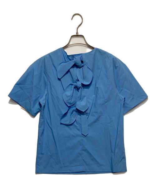 Whim Gazette（ウィムガゼット）Whim Gazette (ウィムガゼット) バックリボンブラウス ブルー サイズ:F 未使用品の古着・服飾アイテム