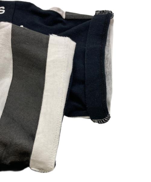 COMME des GARCONS JUNYA WATANABE MAN（コム デ ギャルソン ジュンヤ ワタナベ マン）COMME des GARCONS JUNYA WATANABE MAN (コム デ ギャルソン ジュンヤ ワタナベ マン) メッセージプリントTシャツ ブラック サイズ:Sの古着・服飾アイテム