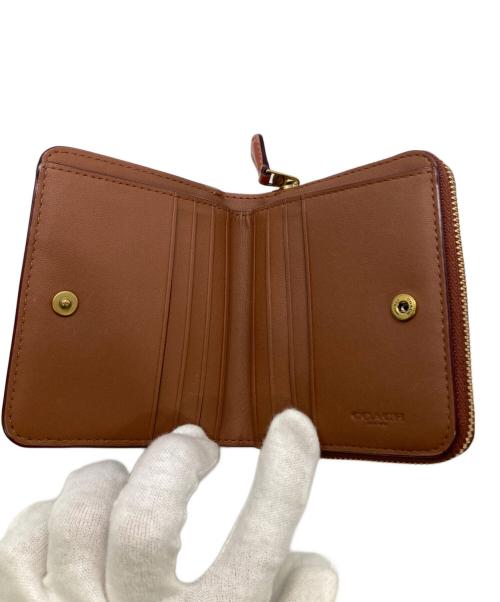COACH（コーチ）COACH (コーチ) レキシープリントビルフォードウォレット ブラウンの古着・服飾アイテム