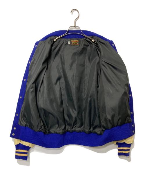 skookum（スクーカム）skookum (スクーカム) 袖レザーワッペンスタジャン ブルー×ベージュ サイズ:44の古着・服飾アイテム