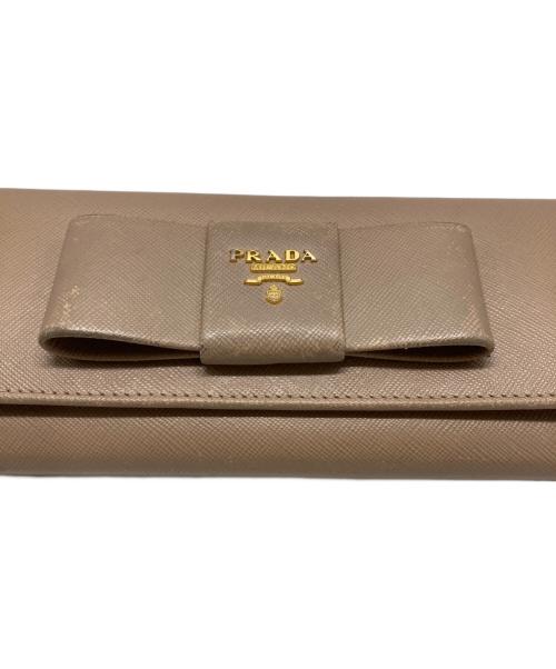 PRADA（プラダ）PRADA (プラダ) サフィアーノリボンウォレット ベージュの古着・服飾アイテム