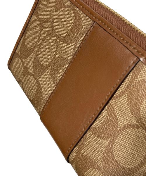 COACH（コーチ）COACH (コーチ) ラウンドジップウォレット ブラウンの古着・服飾アイテム