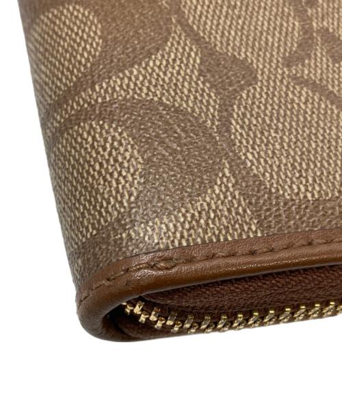 COACH（コーチ）COACH (コーチ) ラウンドジップウォレット ブラウンの古着・服飾アイテム