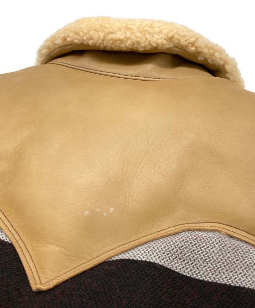 RockyMountainFeatherBed（ロッキーマウンテンフェザーベッド）RockyMountainFeatherBed (ロッキーマウンテンフェザーベッド) ネイティブ柄ダウンベスト レッド×ベージュ サイズ:38の古着・服飾アイテム