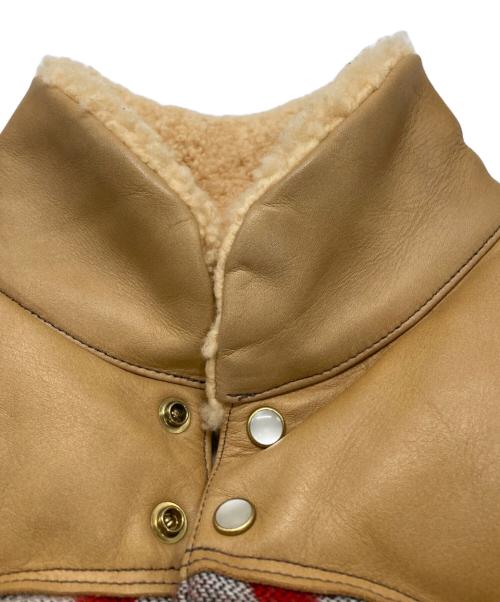 RockyMountainFeatherBed（ロッキーマウンテンフェザーベッド）RockyMountainFeatherBed (ロッキーマウンテンフェザーベッド) ネイティブ柄ダウンベスト レッド×ベージュ サイズ:38の古着・服飾アイテム