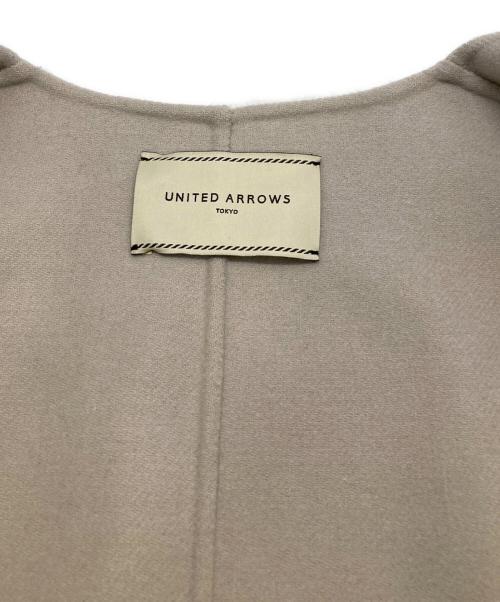 UNITED ARROWS（ユナイテッドアローズ）UNITED ARROWS (ユナイテッドアローズ) リバーノーカラーフェイクファーポケットベスト ベージュ サイズ:36の古着・服飾アイテム