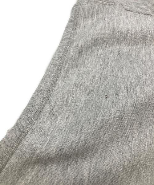 Champion（チャンピオン）Champion (チャンピオン) ダメージ加工リバースウィーブスウェット ライトグレー サイズ:LARGEの古着・服飾アイテム