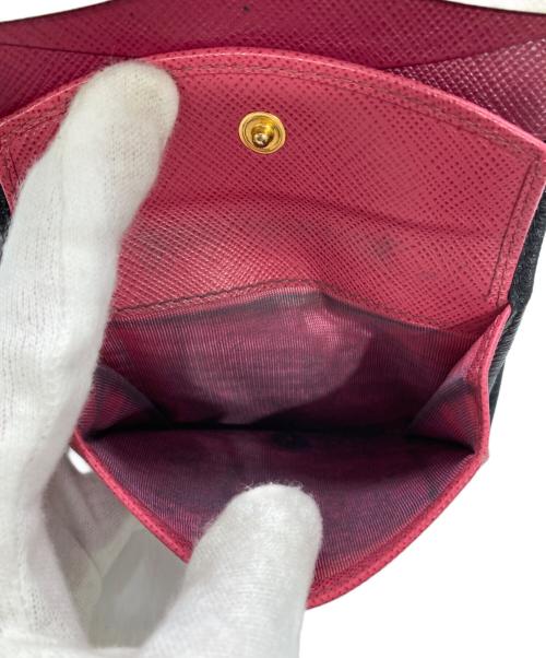 PRADA（プラダ）PRADA (プラダ) バイカラー2つ折り財布 ブラックの古着・服飾アイテム