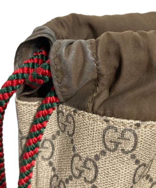 GUCCI（グッチ）GUCCI (グッチ) GGスプリーム ドローストリング タイガーヘッド ナップサック ブラウンの古着・服飾アイテム