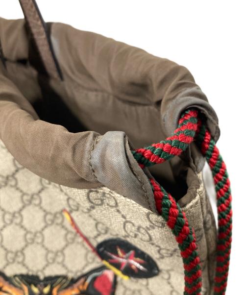 GUCCI（グッチ）GUCCI (グッチ) GGスプリーム ドローストリング タイガーヘッド ナップサック ブラウンの古着・服飾アイテム