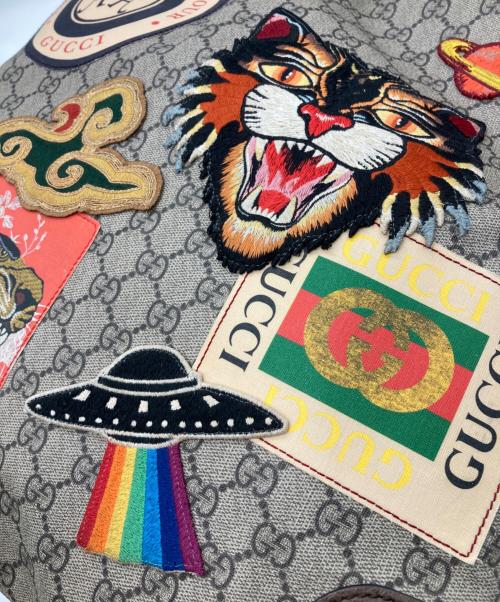 GUCCI（グッチ）GUCCI (グッチ) GGスプリーム ドローストリング タイガーヘッド ナップサック ブラウンの古着・服飾アイテム