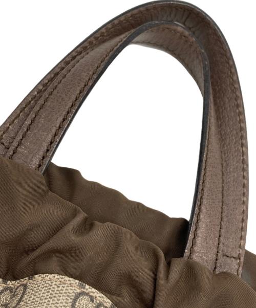 GUCCI（グッチ）GUCCI (グッチ) GGスプリーム ドローストリング タイガーヘッド ナップサック ブラウンの古着・服飾アイテム