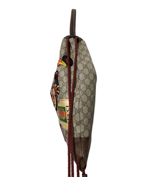 GUCCI（グッチ）GUCCI (グッチ) GGスプリーム ドローストリング タイガーヘッド ナップサック ブラウンの古着・服飾アイテム