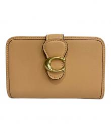 COACH（コーチ）の古着「タビー ミディアム ウォレット」｜ベージュ