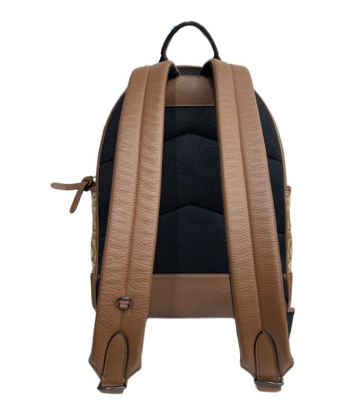 COACH（コーチ）COACH (コーチ) トンプソン バックパック シグネチャー ジャカード ウィズ ヴァーシティ ストライプ/リュック ブラウンの古着・服飾アイテム