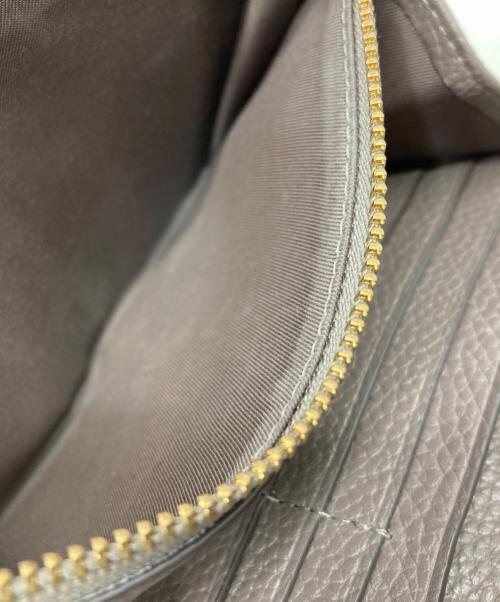 TORY BURCH（トリーバーチ）TORY BURCH (トリーバーチ) 長財布 ブラウンの古着・服飾アイテム