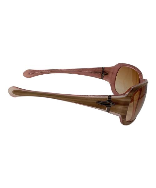 OAKLEY（オークリー）OAKLEY (オークリー) スクリプト サングラス ピンク×ブラウン サイズ:62-15の古着・服飾アイテム