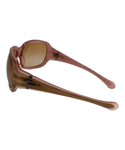 OAKLEY（オークリー）OAKLEY (オークリー) スクリプト サングラス ピンク×ブラウン サイズ:62-15の古着・服飾アイテム