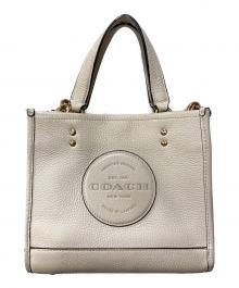 COACH（コーチ）の古着「ショルダーバッグ/デンプシー トート 22 ウィズ コーチ パッチ」｜ベージュ