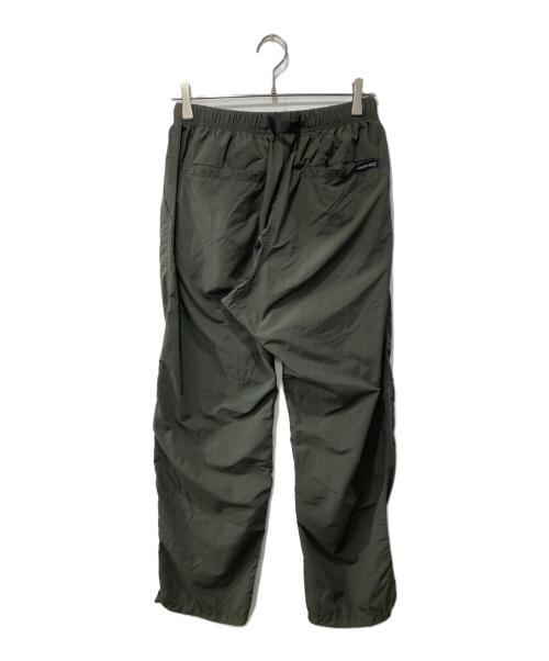 GRAMICCI（グラミチ）GRAMICCI (グラミチ) パンツ/NYLON PACKABLE TRACK PANTS オリーブ サイズ:Mの古着・服飾アイテム