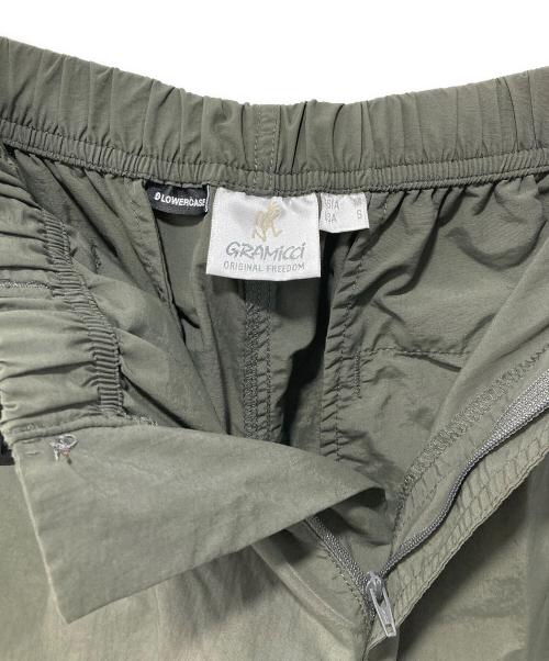 GRAMICCI（グラミチ）GRAMICCI (グラミチ) パンツ/NYLON PACKABLE TRACK PANTS オリーブ サイズ:Mの古着・服飾アイテム