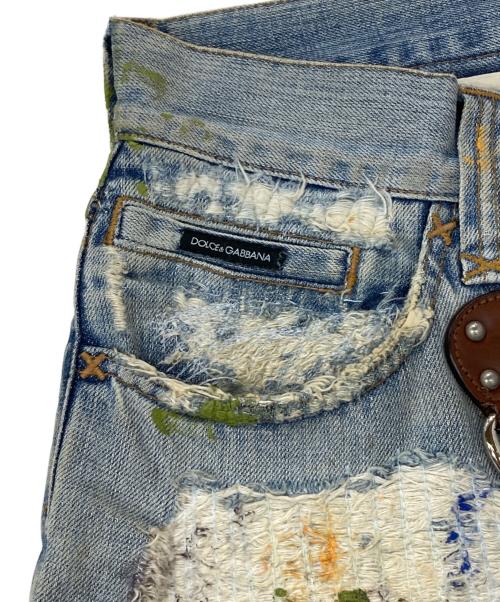 DOLCE & GABBANA（ドルチェ＆ガッバーナ）DOLCE & GABBANA (ドルチェ＆ガッバーナ) ペイント加工ダメージデニムパンツ インディゴ サイズ:44の古着・服飾アイテム