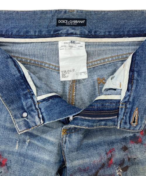 DOLCE & GABBANA（ドルチェ＆ガッバーナ）DOLCE & GABBANA (ドルチェ＆ガッバーナ) ペイント加工ダメージデニムパンツ インディゴ サイズ:44の古着・服飾アイテム