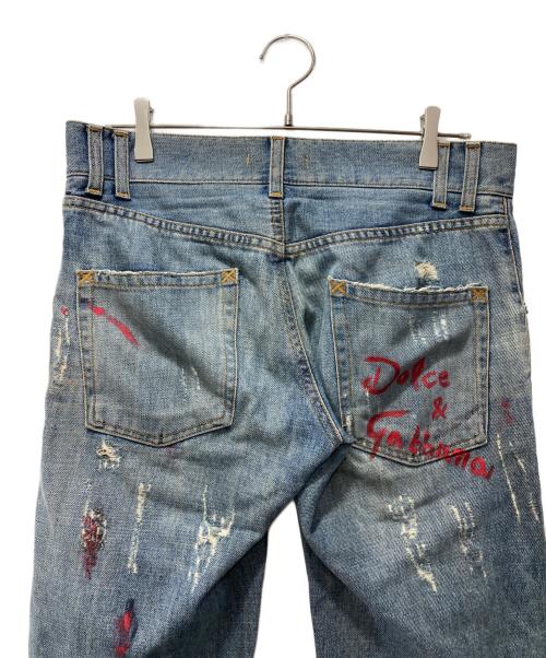 DOLCE & GABBANA（ドルチェ＆ガッバーナ）DOLCE & GABBANA (ドルチェ＆ガッバーナ) ペイント加工ダメージデニムパンツ インディゴ サイズ:44の古着・服飾アイテム