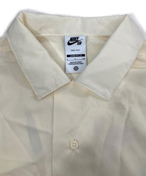 NIKE（ナイキ）NIKE (ナイキ) LOOSE FIT バックプリント S/S シャツ アイボリー サイズ:Sの古着・服飾アイテム