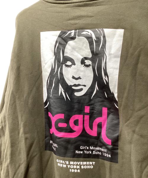 X-GIRL（エックスガール）X-GIRL (エックスガール) パーカー/FACE POSTER SWEAT HOODIE オリーブ サイズ:Lの古着・服飾アイテム
