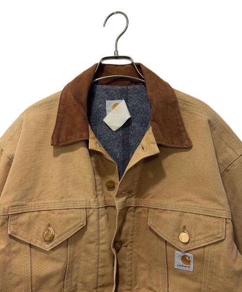 CarHartt（カーハート）CarHartt (カーハート) 裏ブランケットトラッカージャケット ベージュ サイズ:表記なしの古着・服飾アイテム
